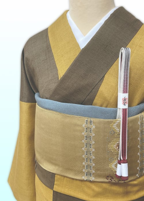 (袷)枯茶地×山吹茶地 染め分け紬 LUKKO-061(リユース品)