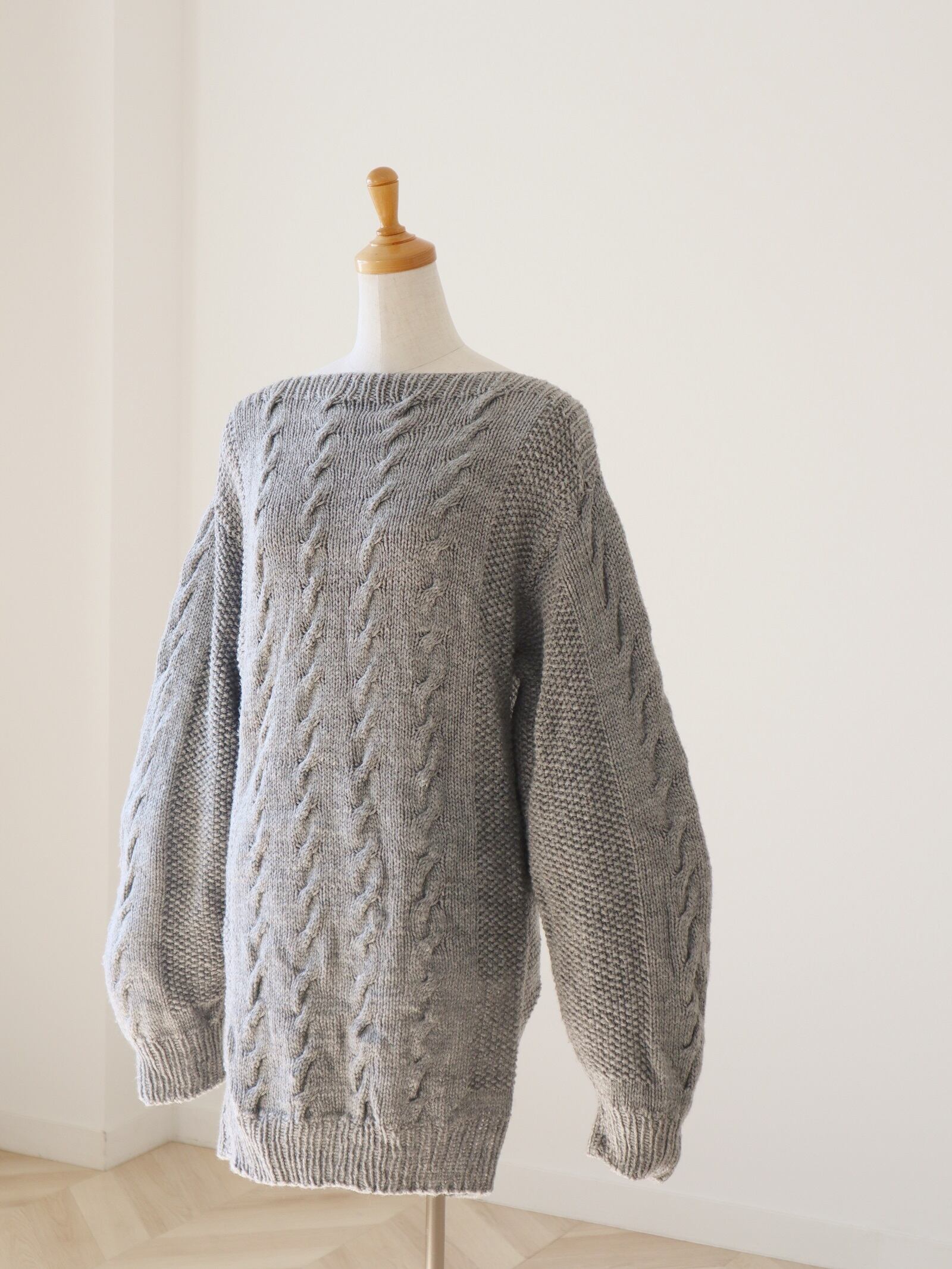 gray color cable knitted boat neck sweater