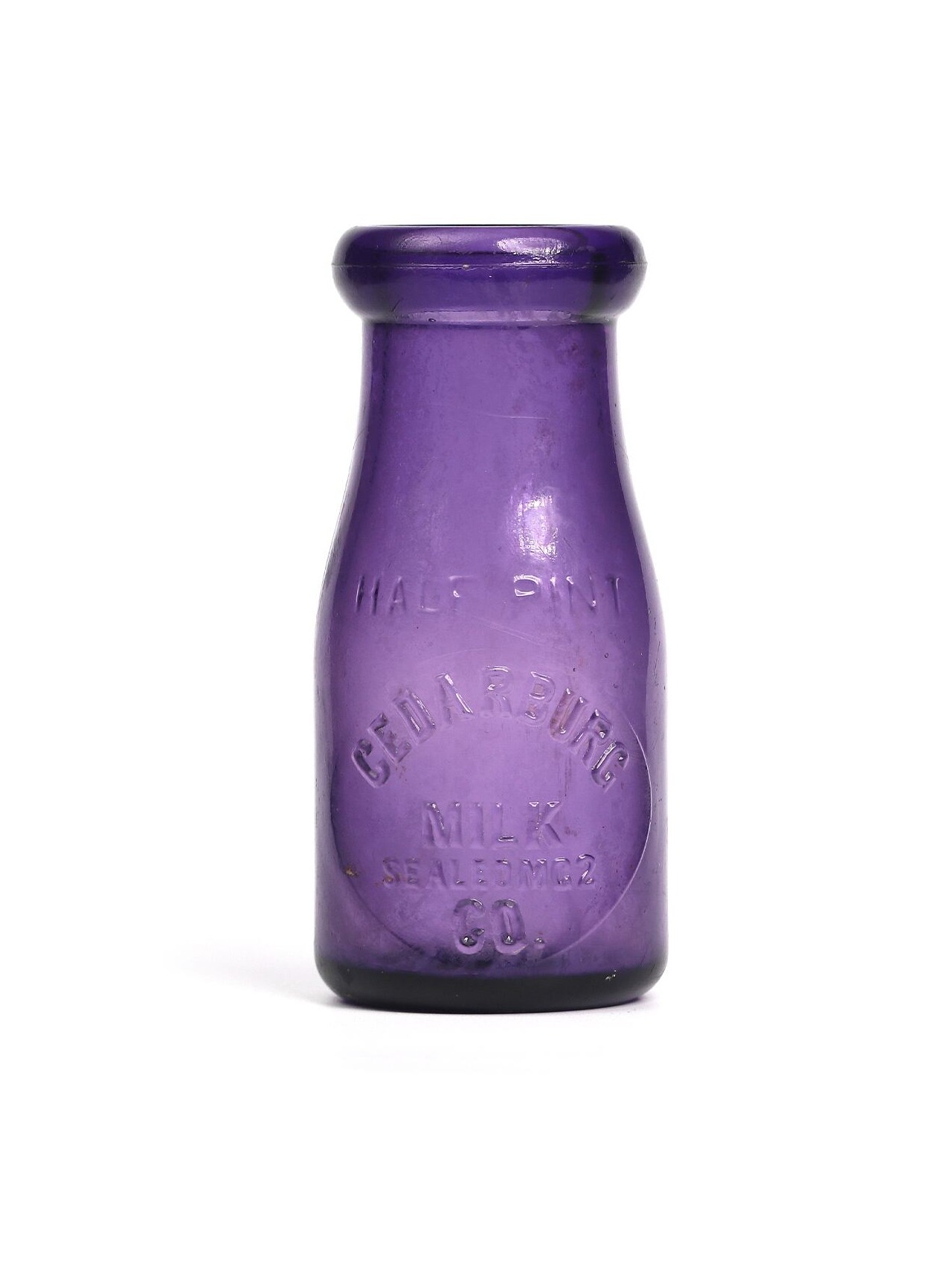 1900's MILK BOTTLE