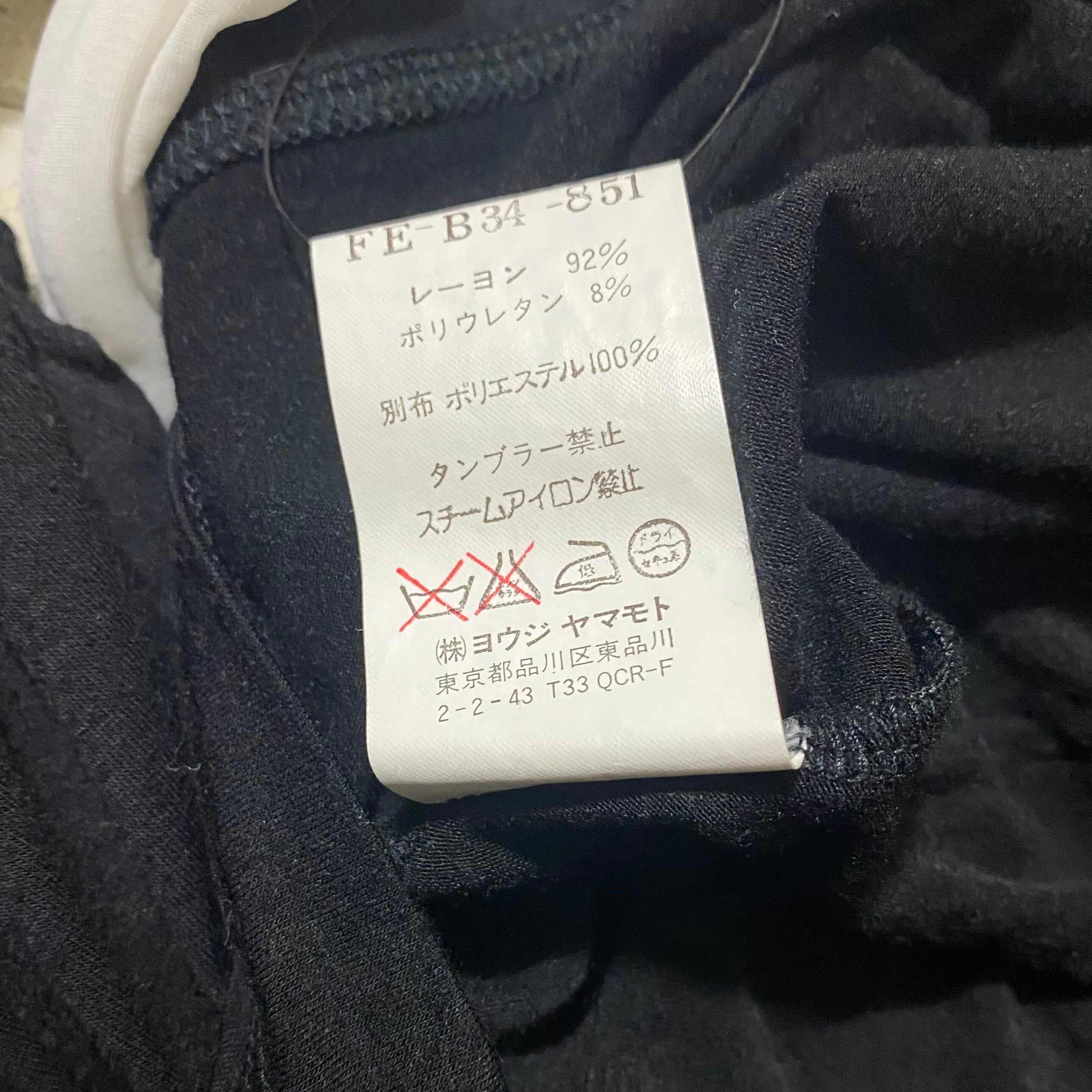 YOHJI YAMAMOTO hi-neck pullover “般若心経” | NOIR ONLINE
