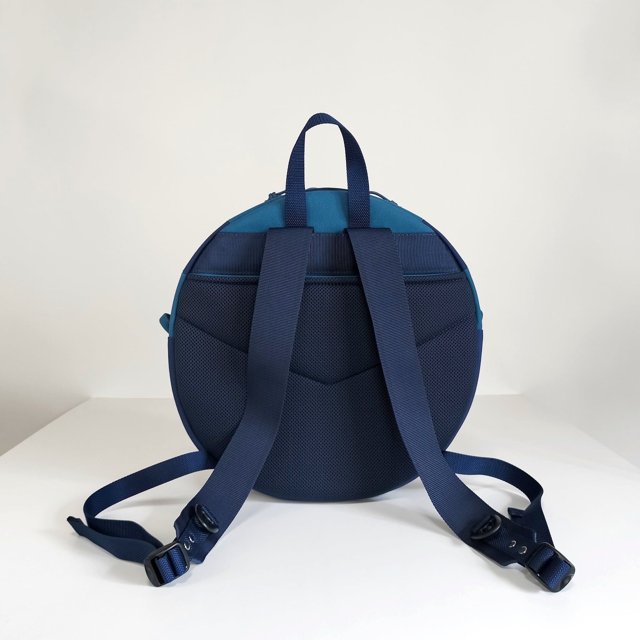 円形リュック ミネラルブルー x ネイビー | JUTSUBI Design Store
