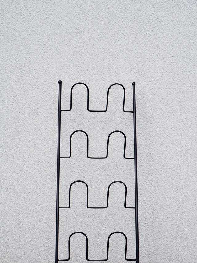 black wire magazine or slipper rack