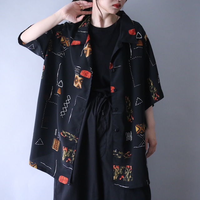 geometry art graphic pattern XXX over silhouette open collar h/s shirt