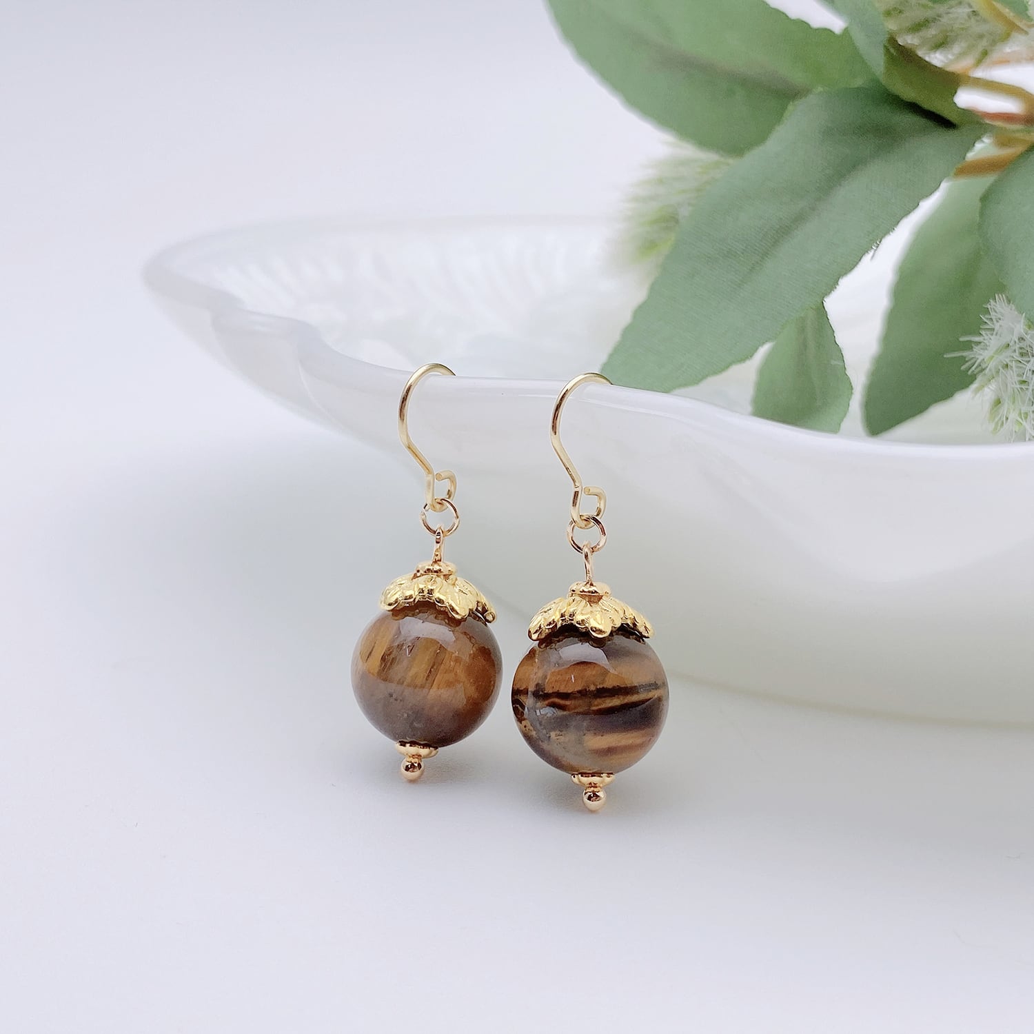 オブシディアン×タイガーアイフープイヤリング オブシディアン×タイガーアイフープイヤリング - メルカリ