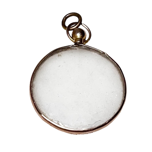 antique metal pendant