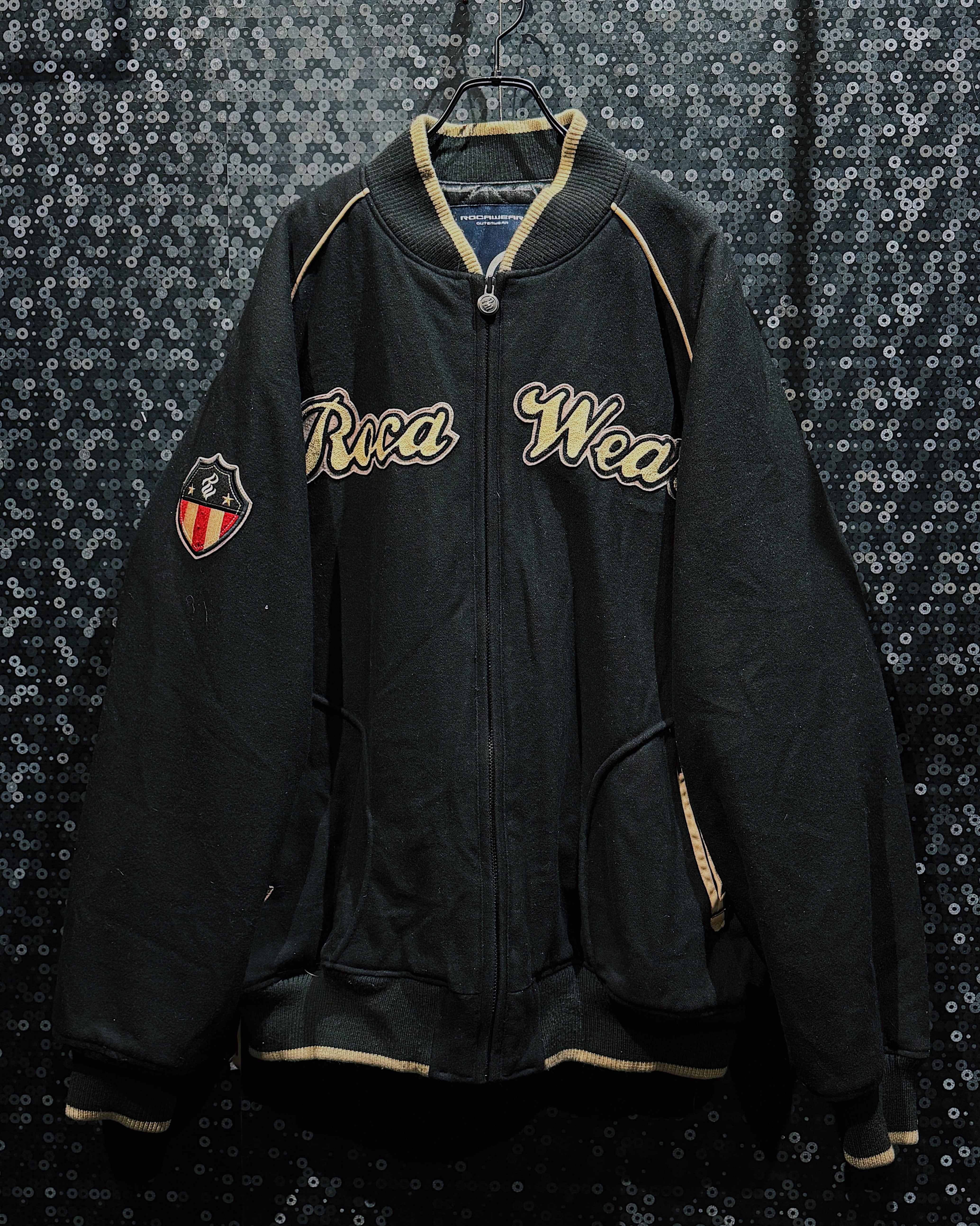 【ÆIEM】“ROCAWEAR” vintage script logo zip stadium jacket black × gold