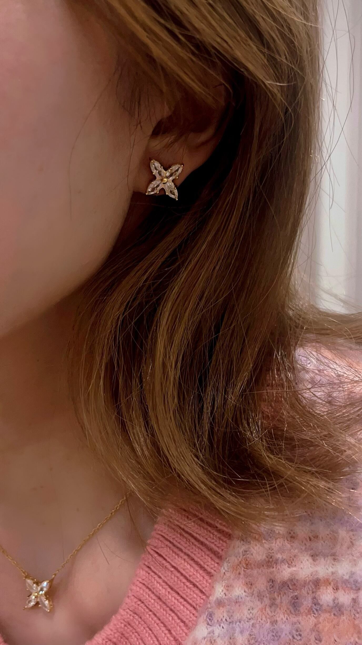 Shine flower pierce | milcy（ミルシー） 大人フェミニンアクセサリー