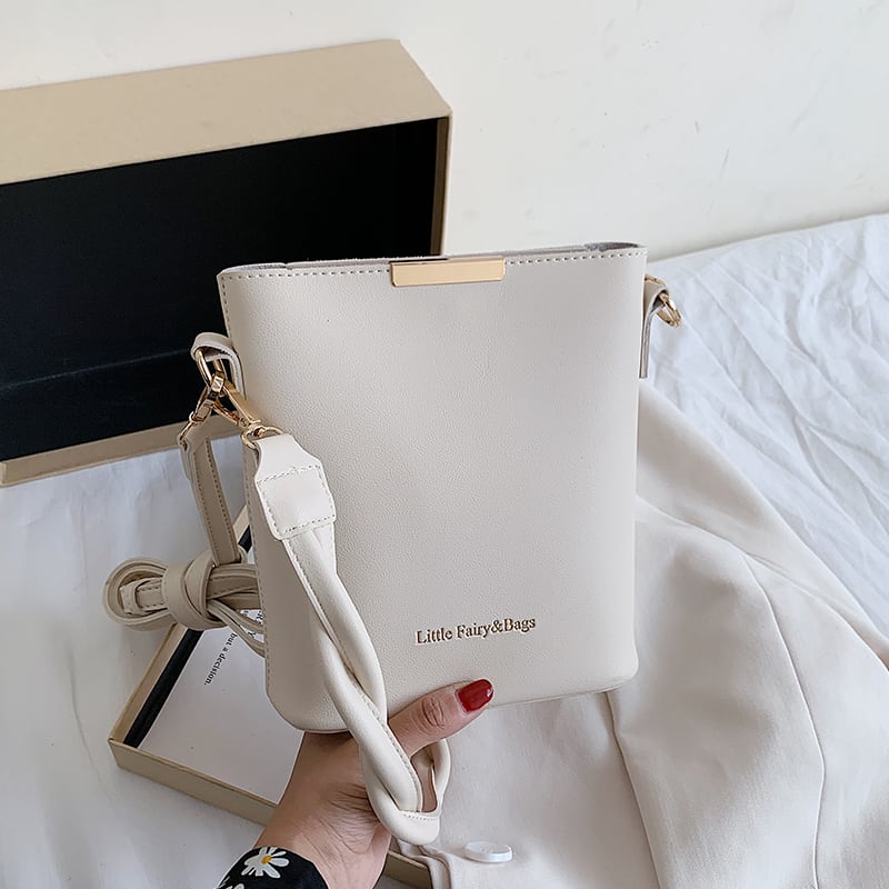 ウエスタンスタイルバケットバッグ2020新しいトレンディなネット赤ハイエンド夏の野生の女性のバッグテクスチャシングルショルダーメッセンジャーバッグ Tiancai_Wing_Bag3238739