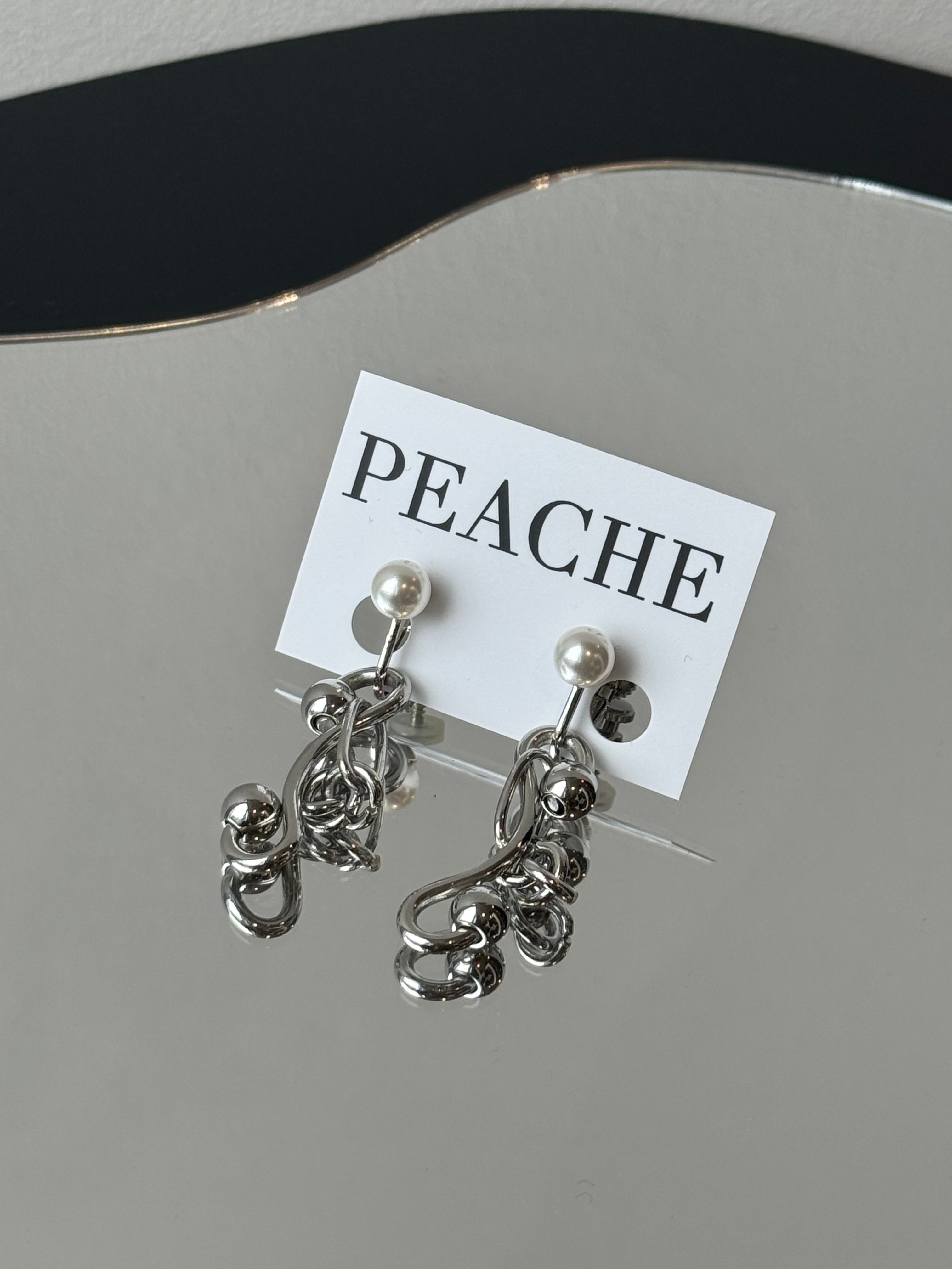 pearl silver wiggle bone petit circle mix
