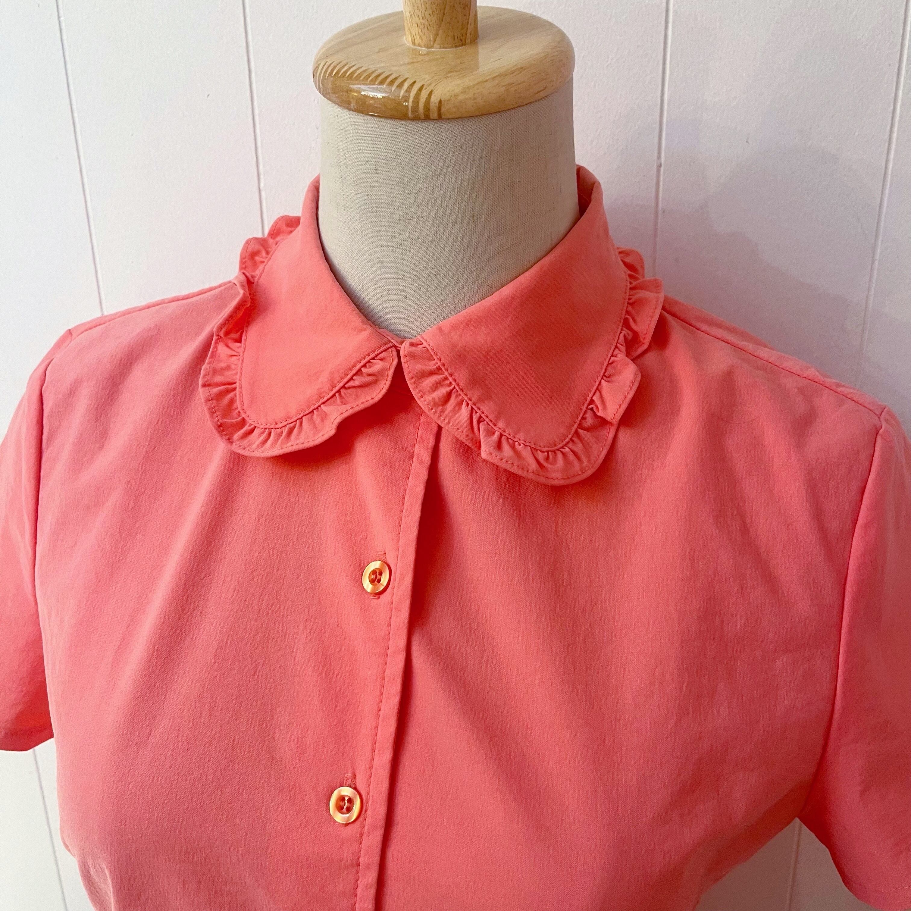 fluorescent pink frill blouse