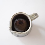 コーヒーにミルクをたらしたようなジャグ