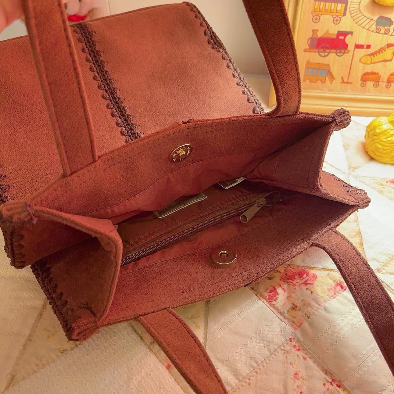 brown suede hand bag