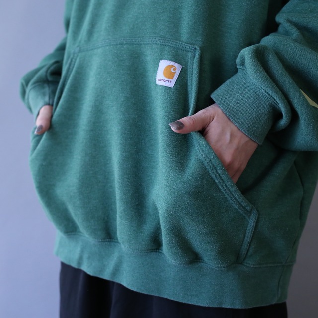 "carhartt" over silhouette sleeve printed sweat pullover