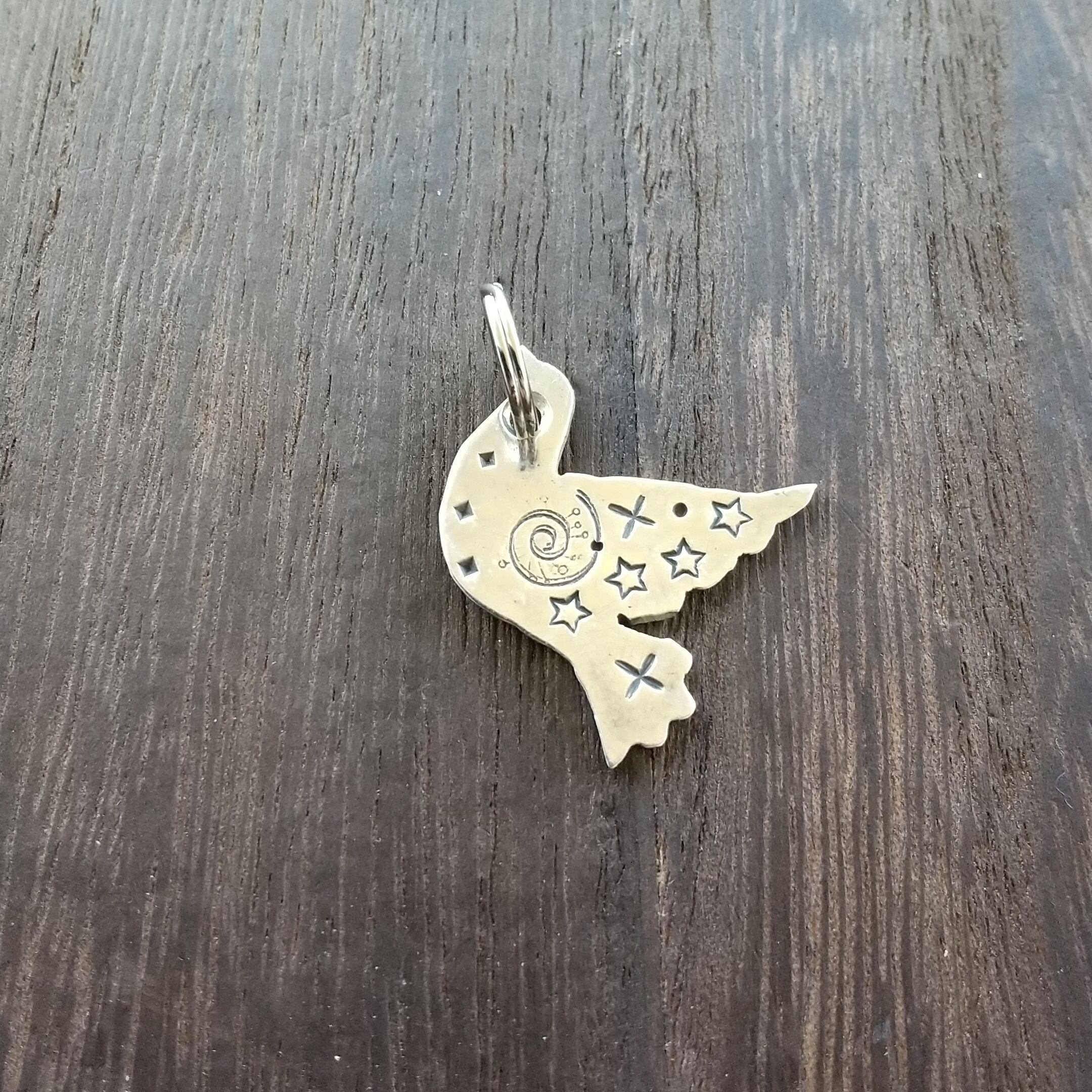 太古の宝を持った青いとりペンダント