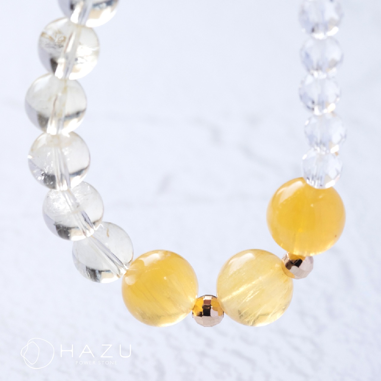 太陽輝く努力実る金運ブレス［ニードルインゴールデンフローライト／レモンクォーツ／水晶］