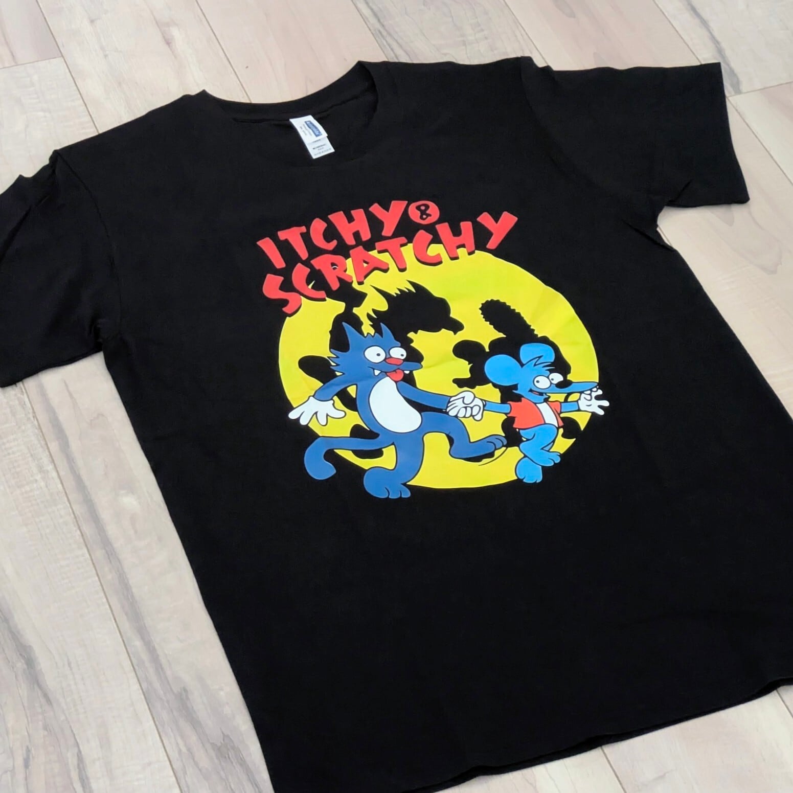 【 The Simpsons（ ザ・シンプソンズ ) 】『 The Itchy & Scratchy Show / イッチー＆スクラッチー 』 Tシャツ / BLACK〚アメリカン雑貨 アメトイ〛