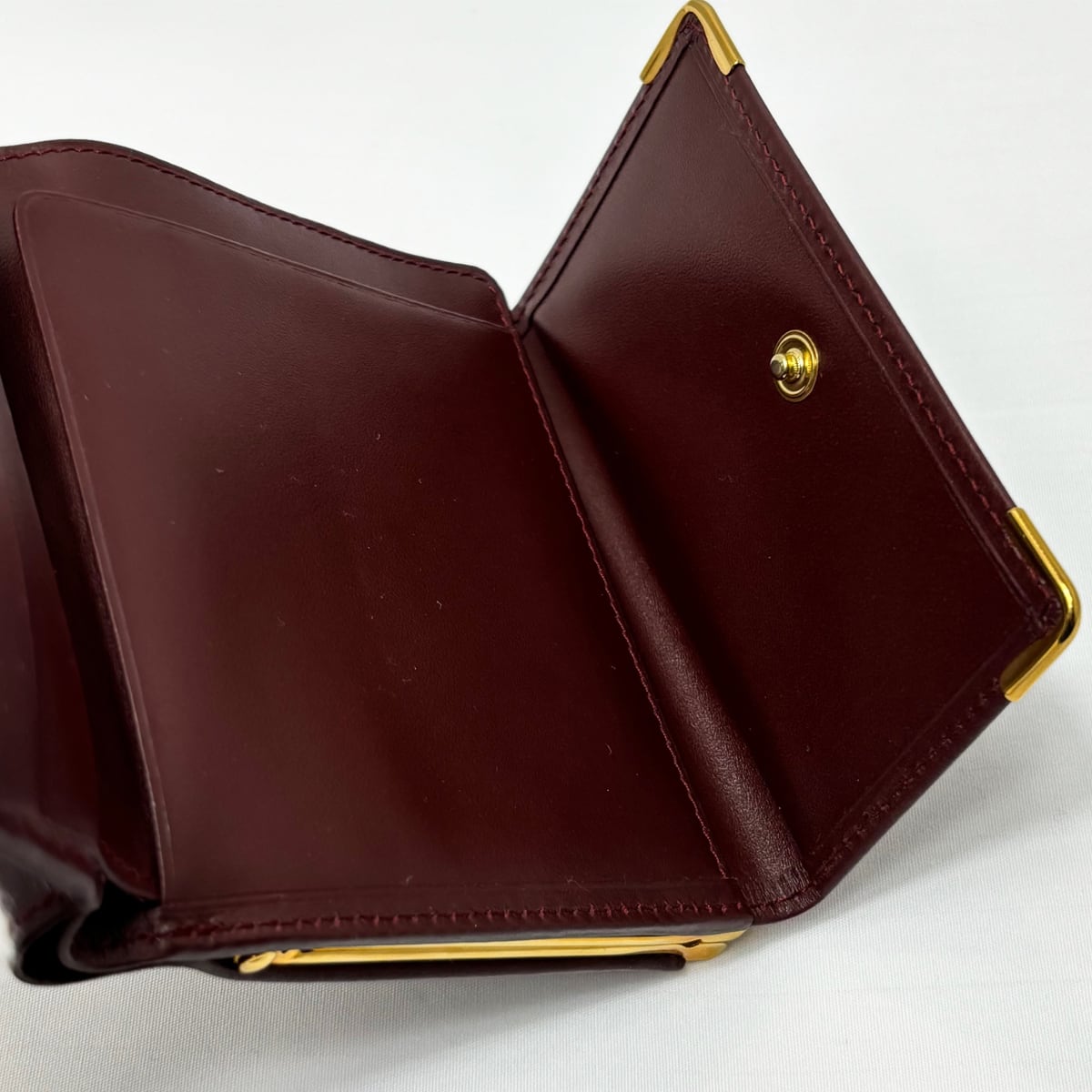 中古】 カルティエ マストドゥカルティエ がま口 財布 ボルドー
