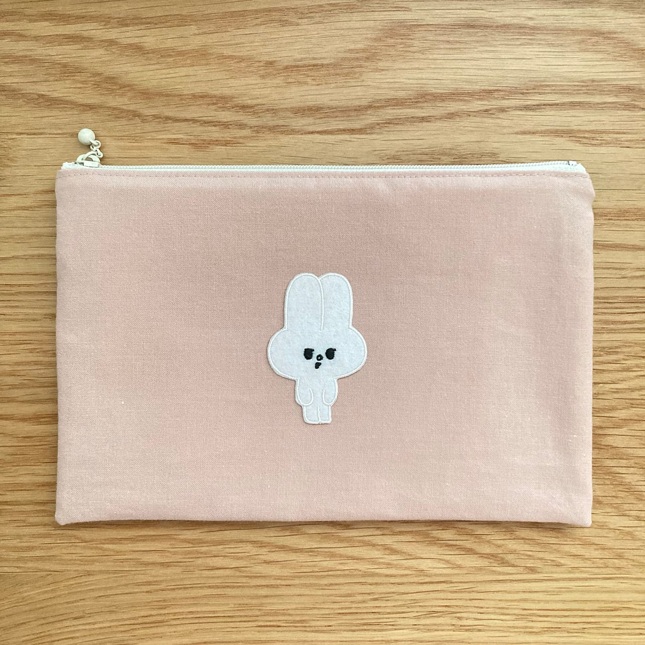 フラットポーチむくみちゃん（ピンク）