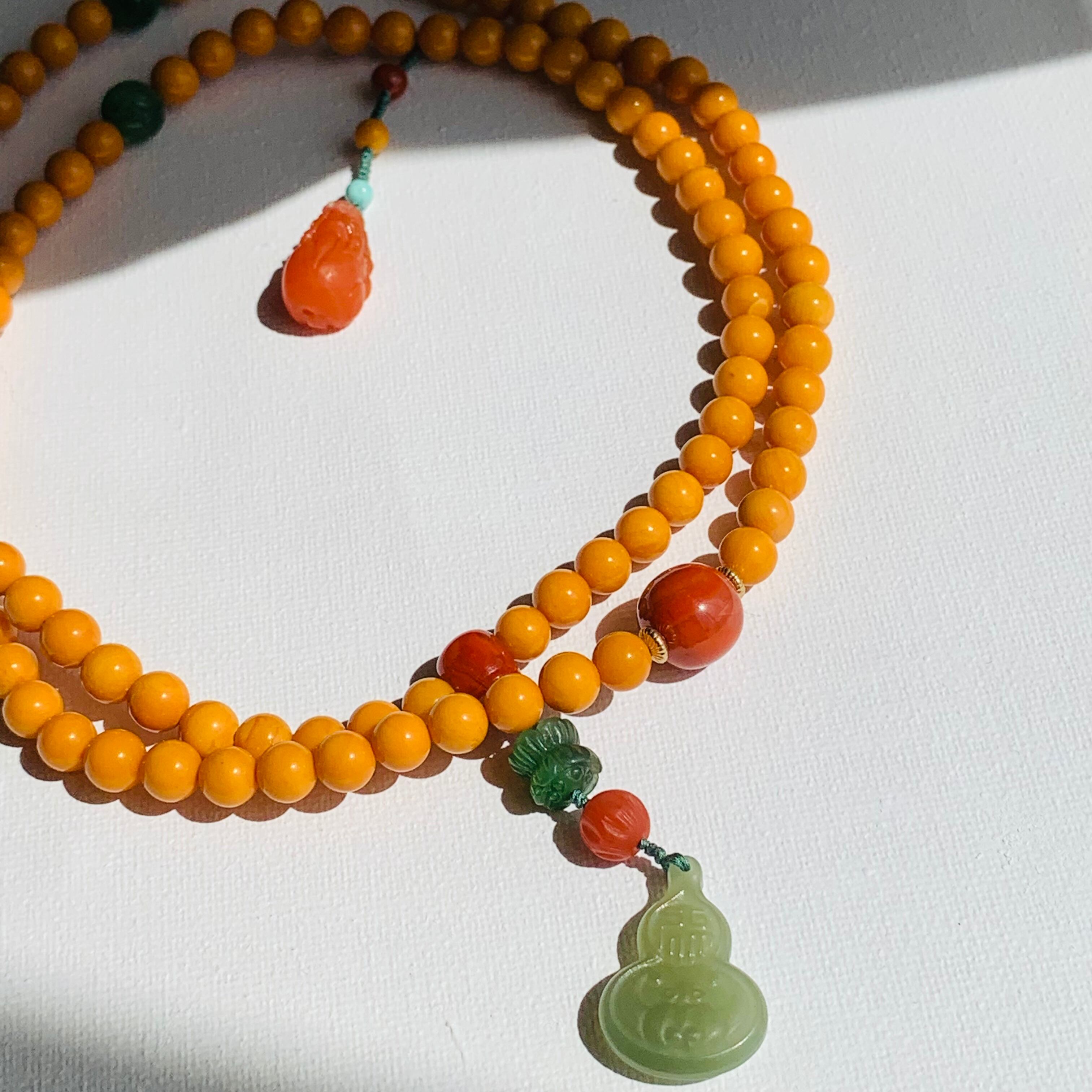 数珠 男性用 20玉 レッドアンバー 琥珀仕立 梵天房 山田念珠堂 - 通販