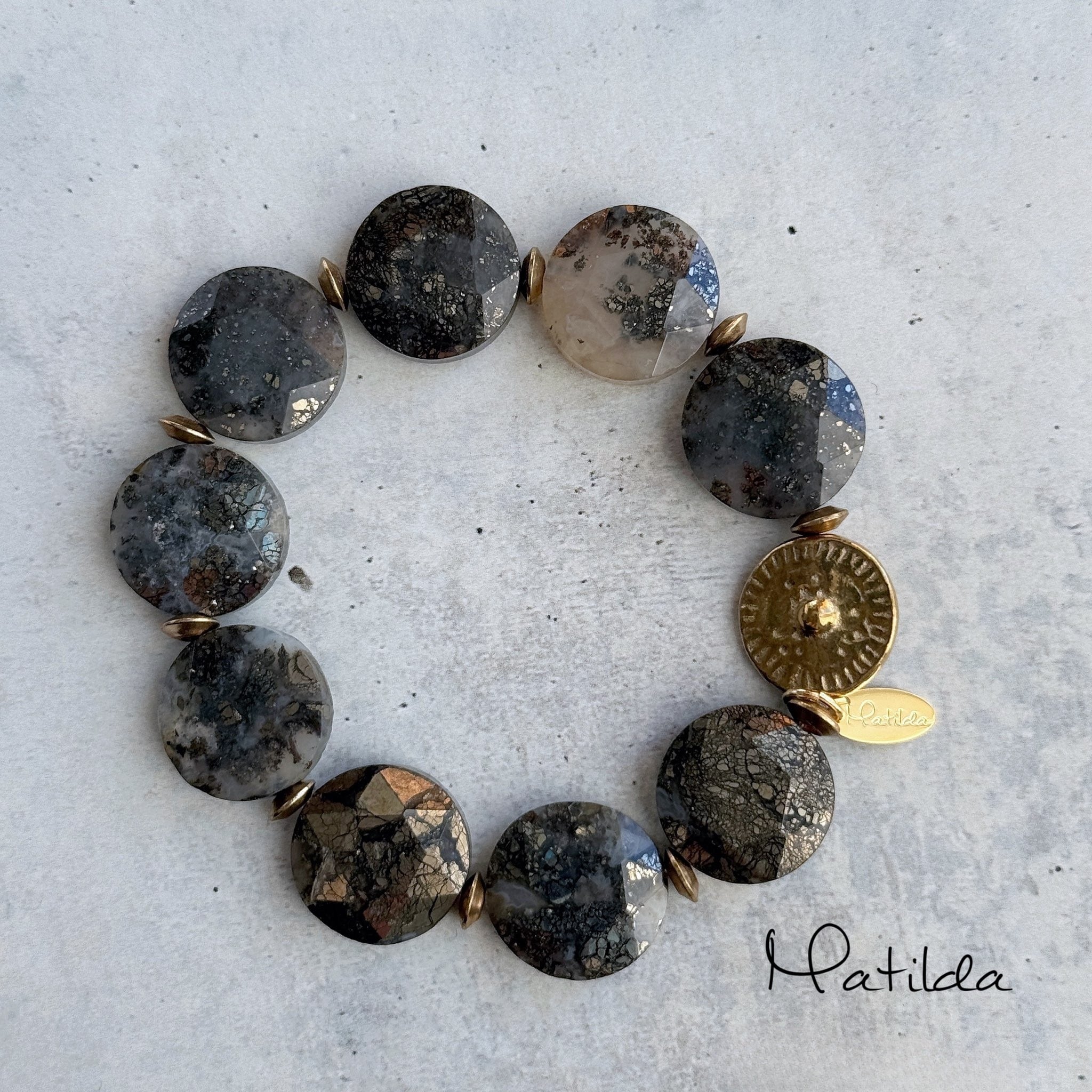 tumble bracelet(ニポモマーカサイト)