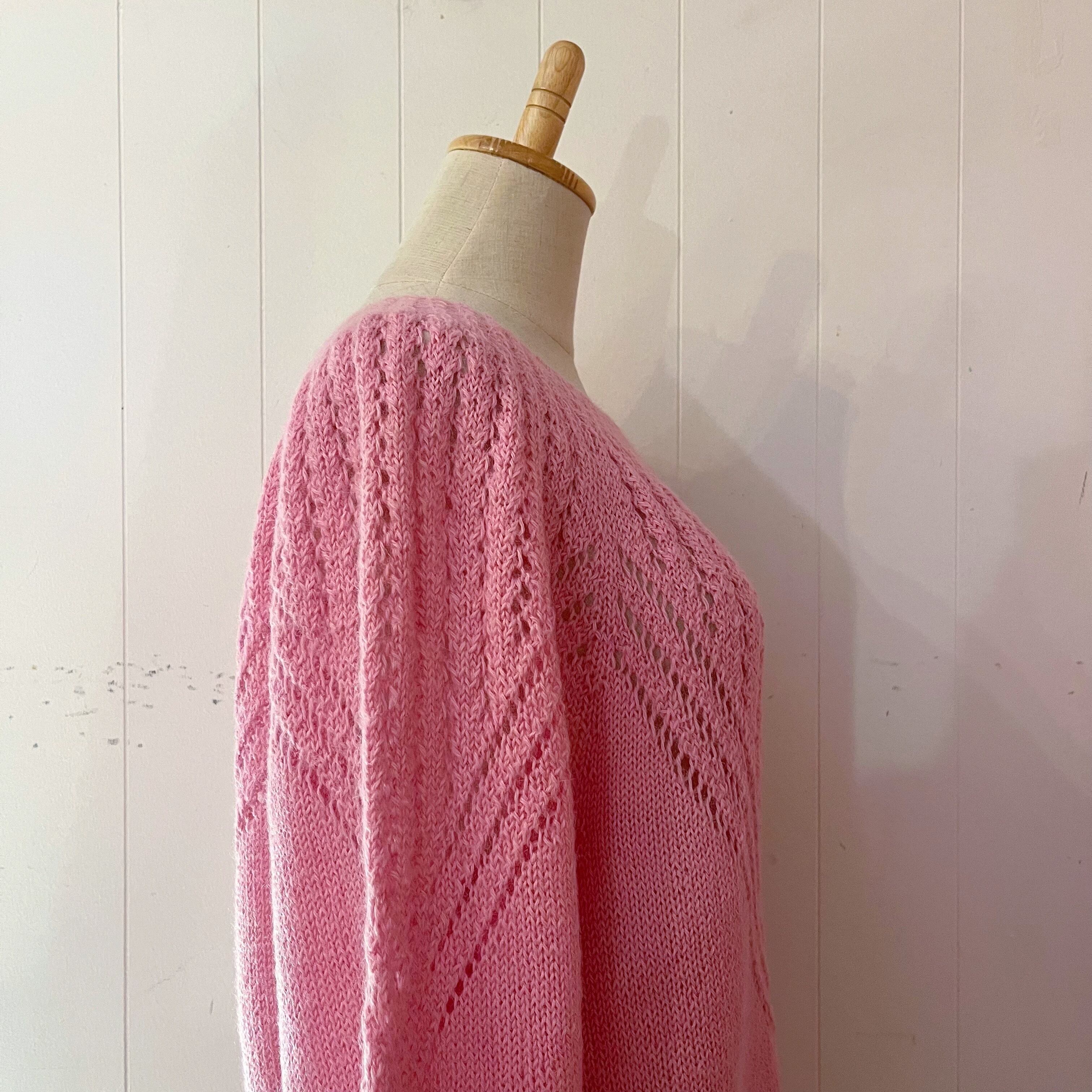 pink openwork knit sweater