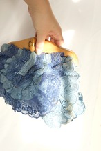 Laced design clutch bag