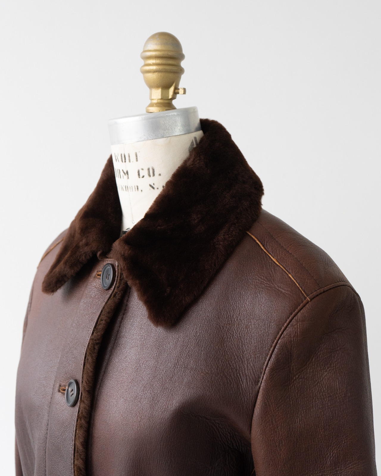 〈PRADA〉Belted Mouton coat