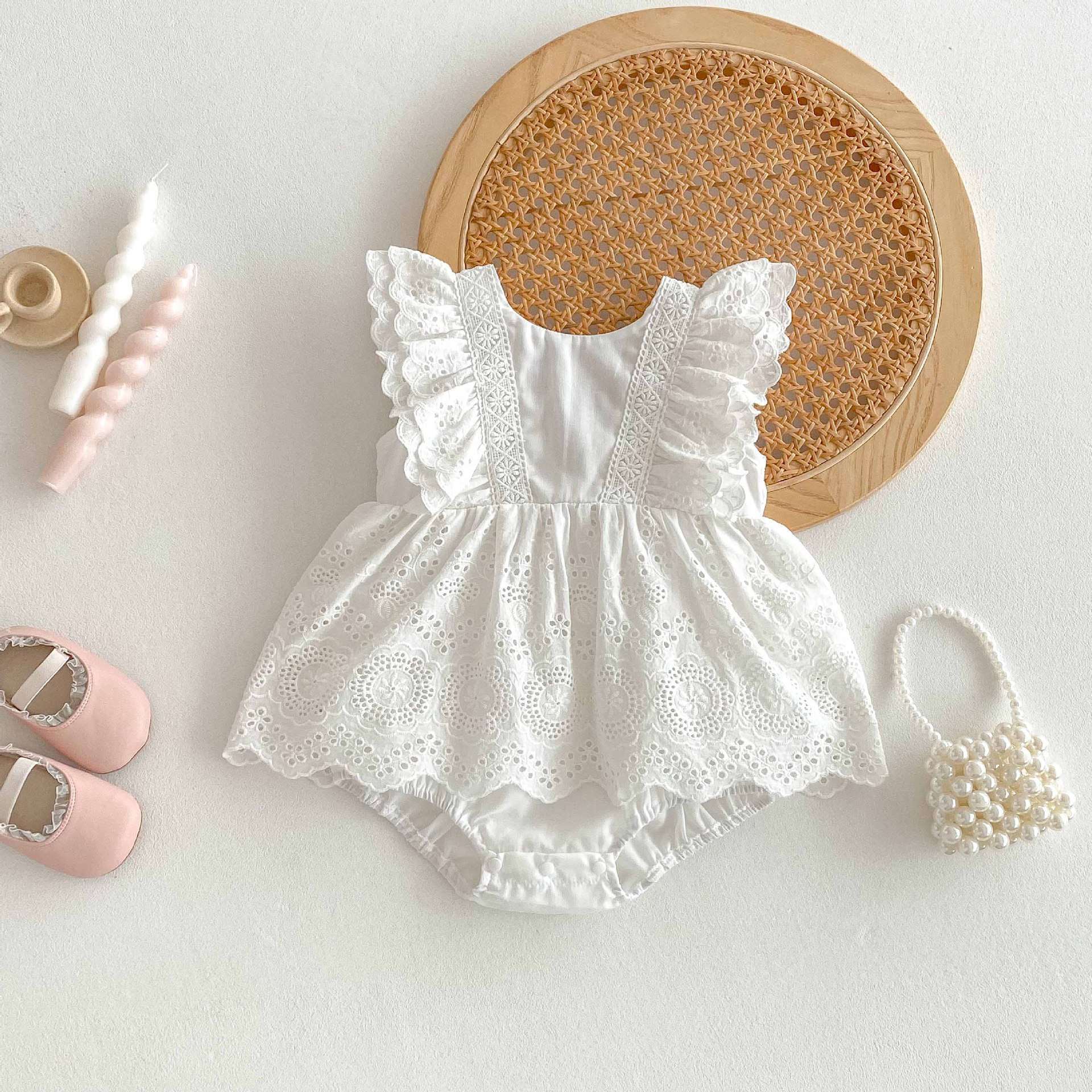 バックリボンオープンロンパース