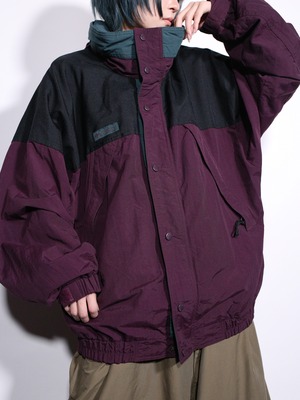 "Colombia" poison coloring over silhouette mountain jacket