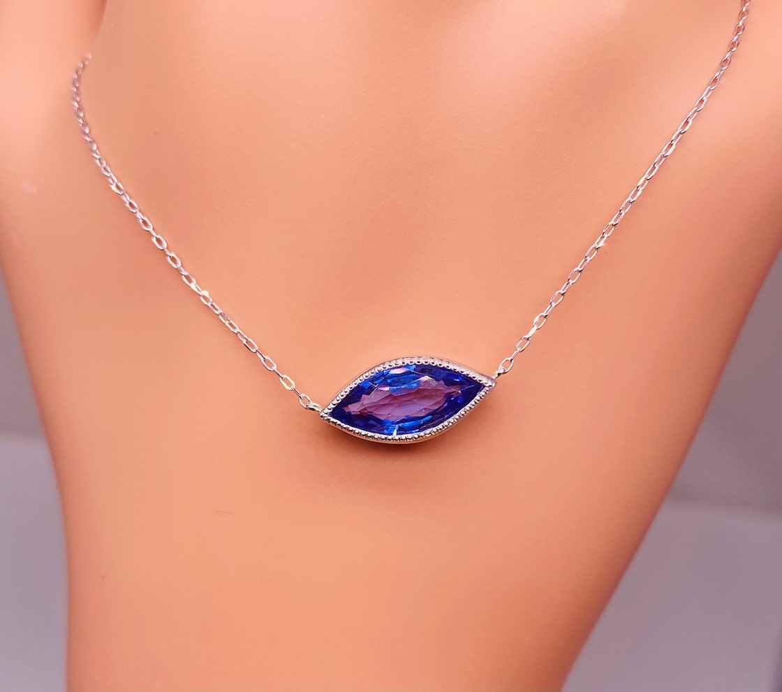 ☆スマイルペンダント☆Pt850/900 タンザナイト カラーストーン  