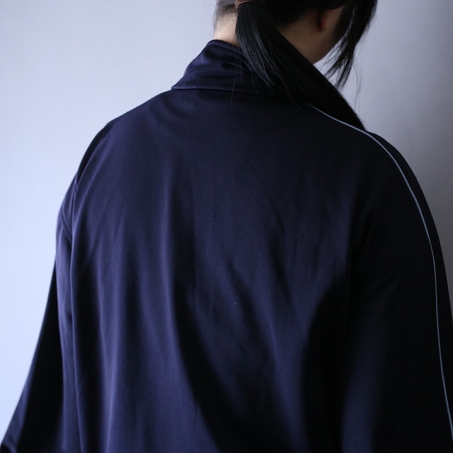 "puma" piping line design over silhouette track jacket