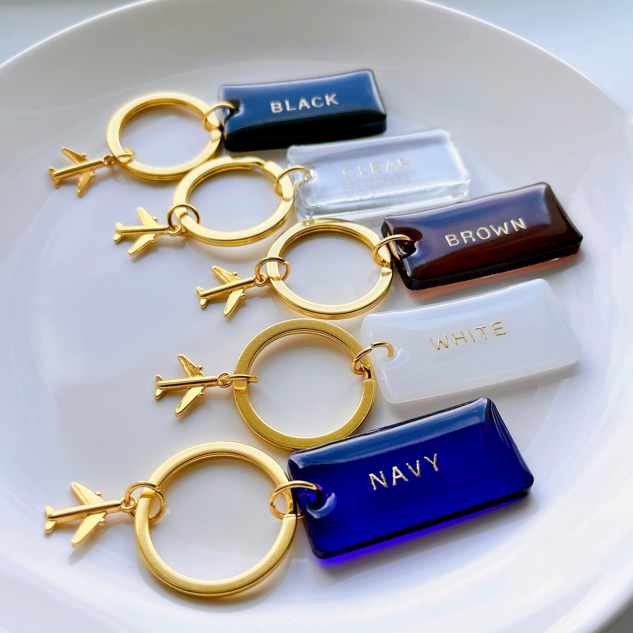 飛行機チャーム付きネームタグ クルータグ | アトリエNico