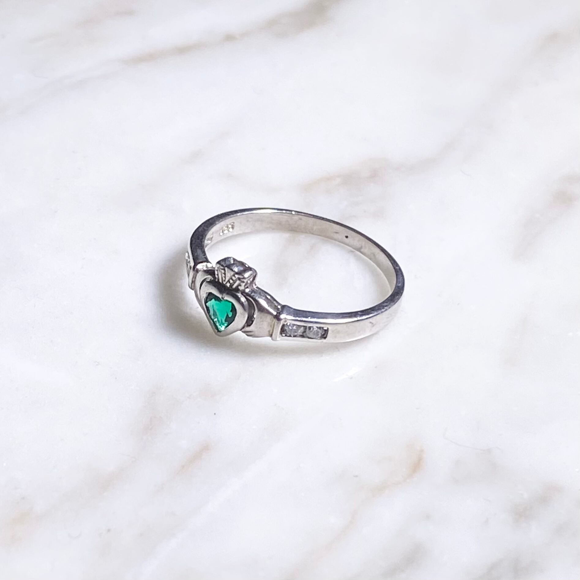 vintage silver claddagh ring set with green & clear stone | NOIR ONLINE
