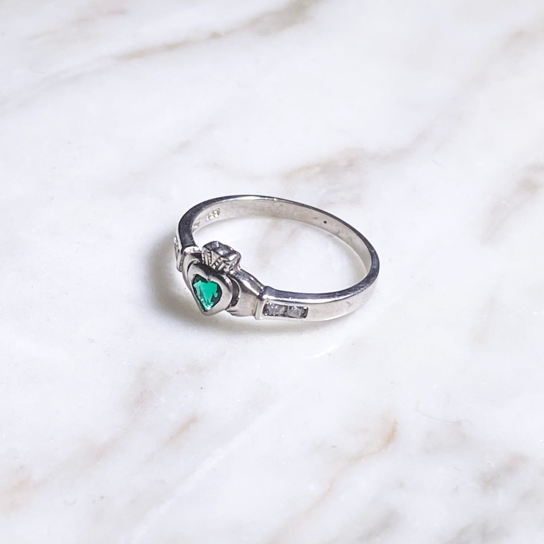 vintage silver claddagh ring set with green & clear stone | NOIR ONLINE