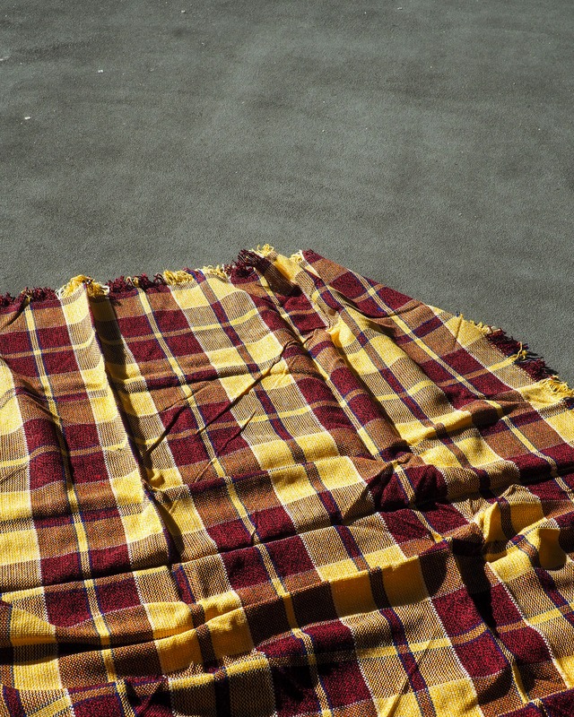 yellow, blue, and dark red plaid big blanket