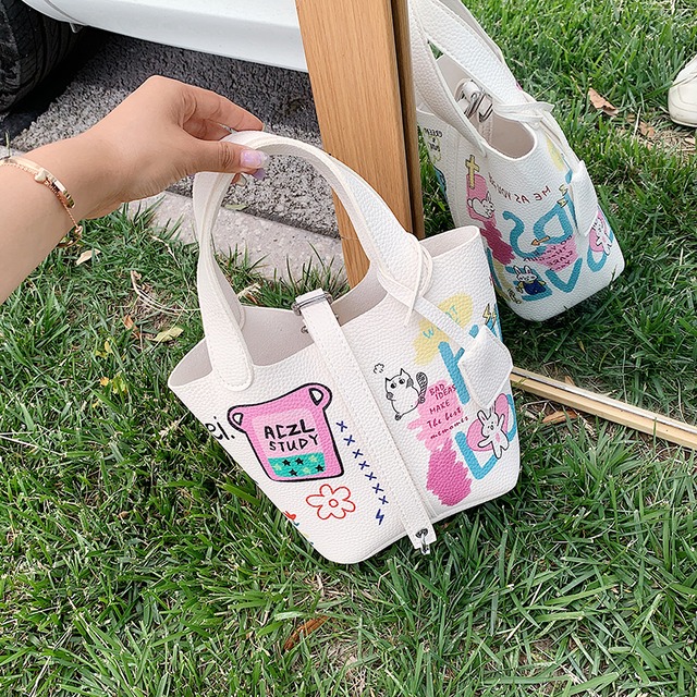 フレンチニッチバッグ女性バッグ2020新しい潮ネット赤いファッション漫画ポータブルメッセンジャーバッグ夏のバケットバッグ Tiancai_Wing_Bag1129688