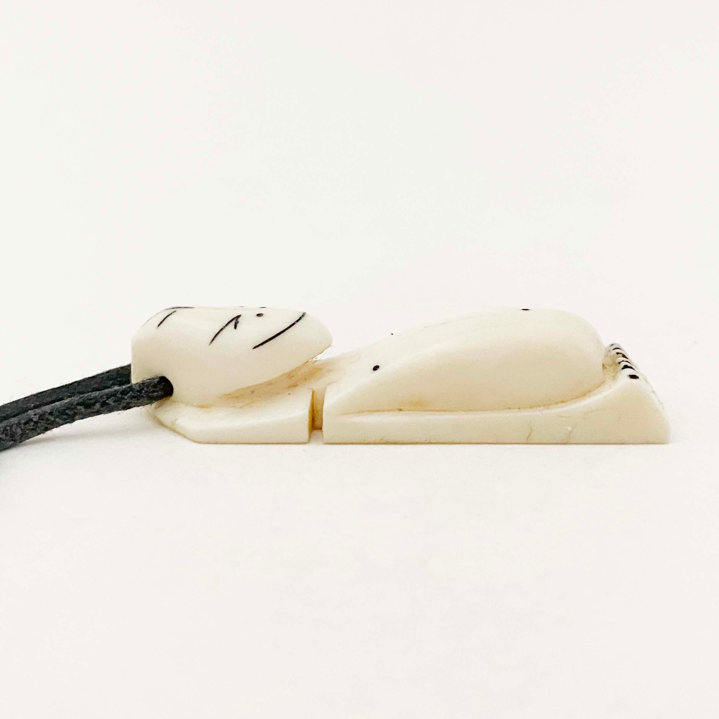 象牙のビリケンのペンダント