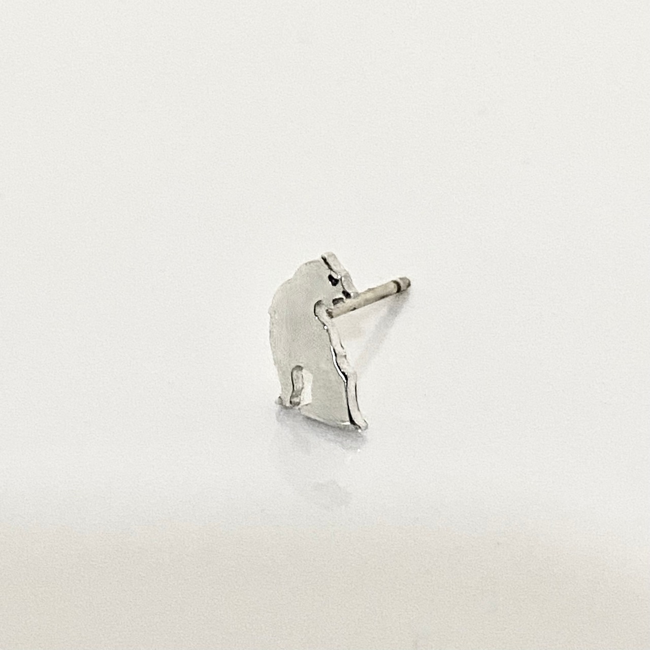 CUT OUT WOLF STUD / カットアウトウルフピアス