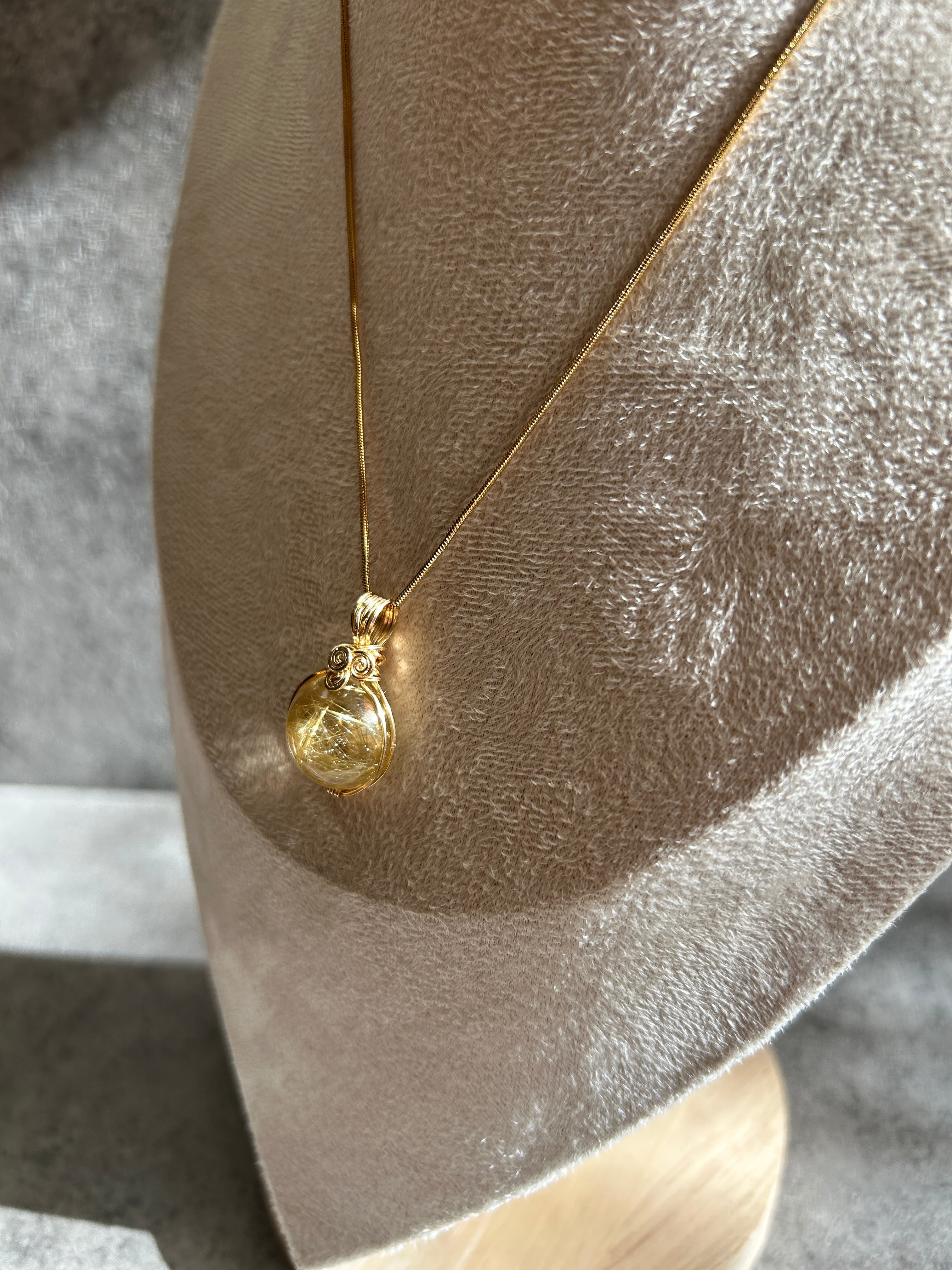 ルチルinクオーツペンダントトップ 14kgf