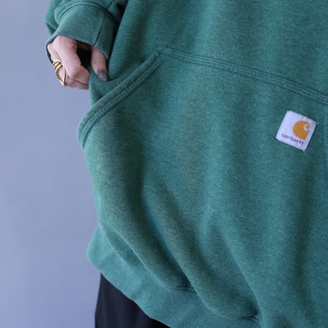 "carhartt" over silhouette sleeve printed sweat pullover