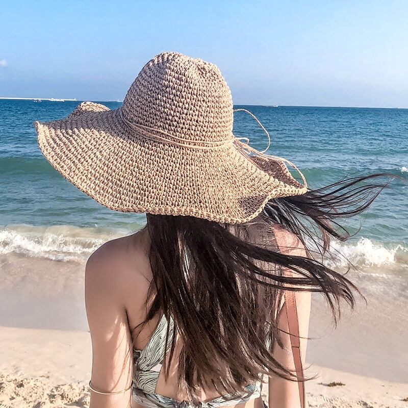 ビーチハット女性の夏の海辺の麦わら帽子手作りの中空大きなつばの日よけ帽文学的な新鮮な折りたたみ式日よけ帽 ブラック・アイド・ピーズ99248003023