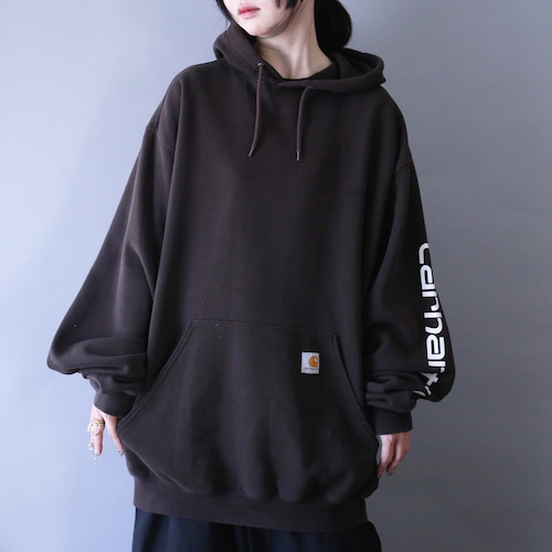 "carhartt" sleeve printed design over silhouette brown parka