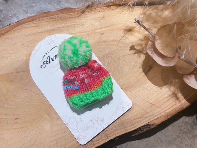 手編みのポンポン帽子　グリーン