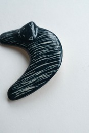 Handmade ceramic crescent cat brooch