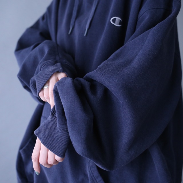 "Champion" dark navy color over silhouette sweat parka