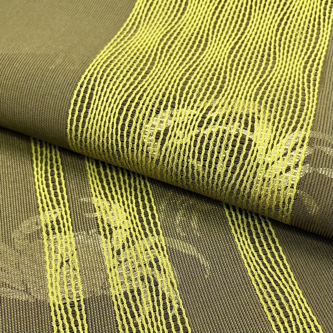 袋帯 紗紬から透けて見える蟹柄 縦よれ縞織模様 金通し 千歳茶色 O  