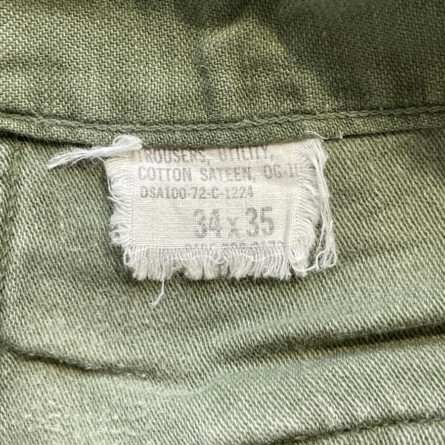 米軍OG-107ベイカーパンツの白いタグ TROUSERS UTILITY COTTON SATEEN DSA100-72-C-1224 34x35