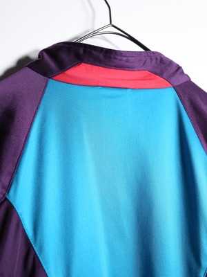 "NIKE" psychedelic color over silhouette track jacket