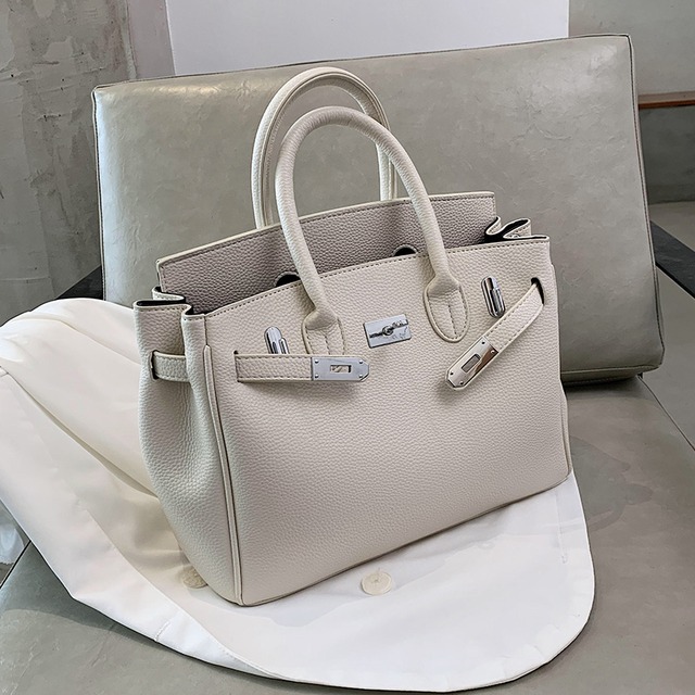 オータムウィンターレッドシングル 秋物 冬物 ハンドバッグ メッセンジャーバッグ 手作りハンドバック63696903814