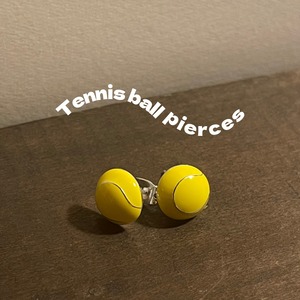 Tennis ball pierces